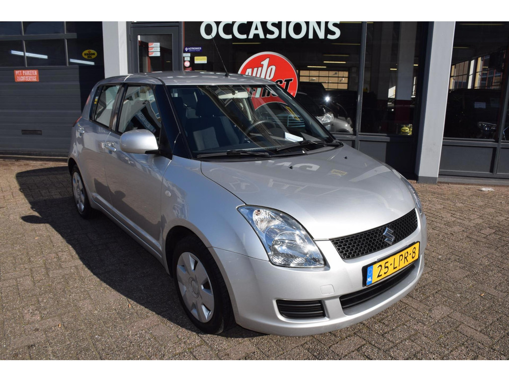 Suzuki Swift 1.3 Cool, Airco, Electr. ramen en spiegels, Radio-CD, Aux-USB, Getinte Ramen, Centrale deur vergrendeling. 50956834-0.jpg | Autobedrijf Hassing